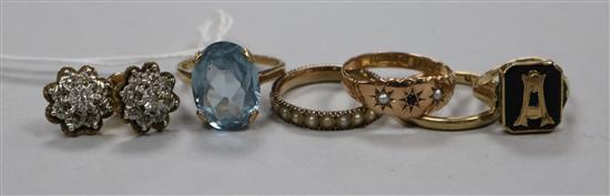 Five assorted 9ct gold rings including gem set and a pair of 9ct gold and diamond set ear studs.